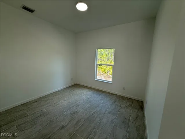 an empty room with a window