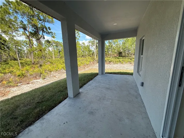 a view of an empty room and window