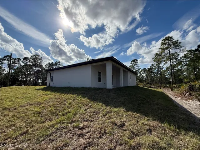 a house view with a garden space