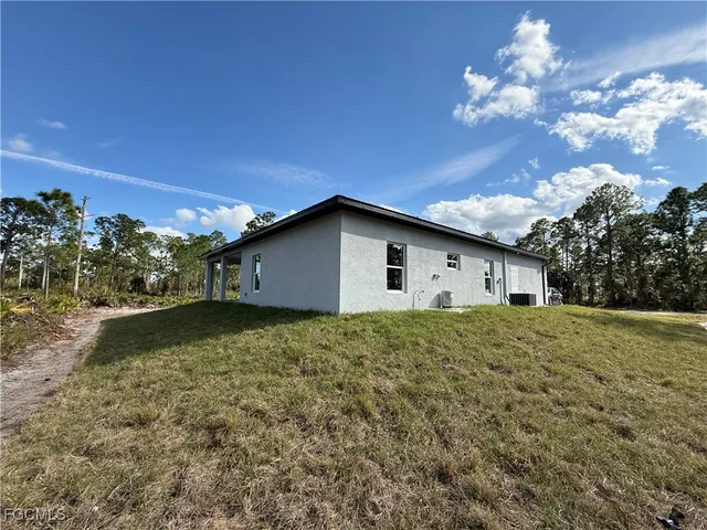 a house view with a garden space