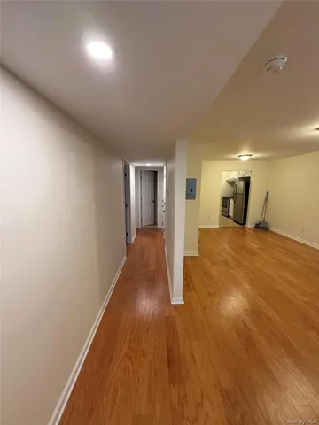 a view of a livingroom with wooden floor