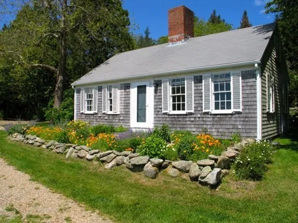 front view of a house with a yard