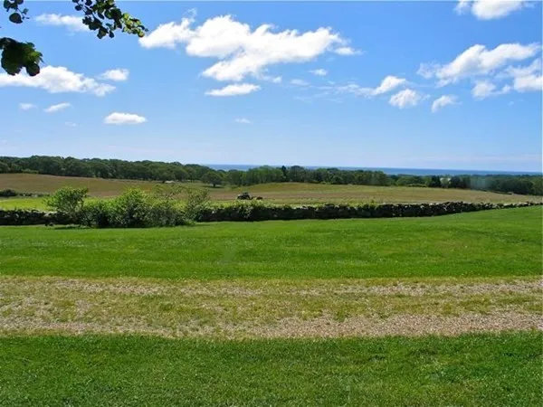 a view of a golf course with a lake