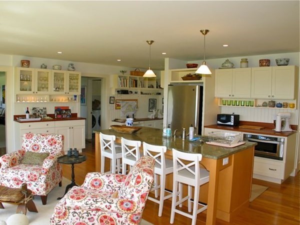 384 Middle Road Chilmark, MA 02535 - Photo 7 of 31 a kitchen with stainless steel appliances kitchen island granite countertop a sink and cabinets