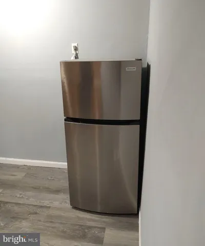 a view of staircase with white walls