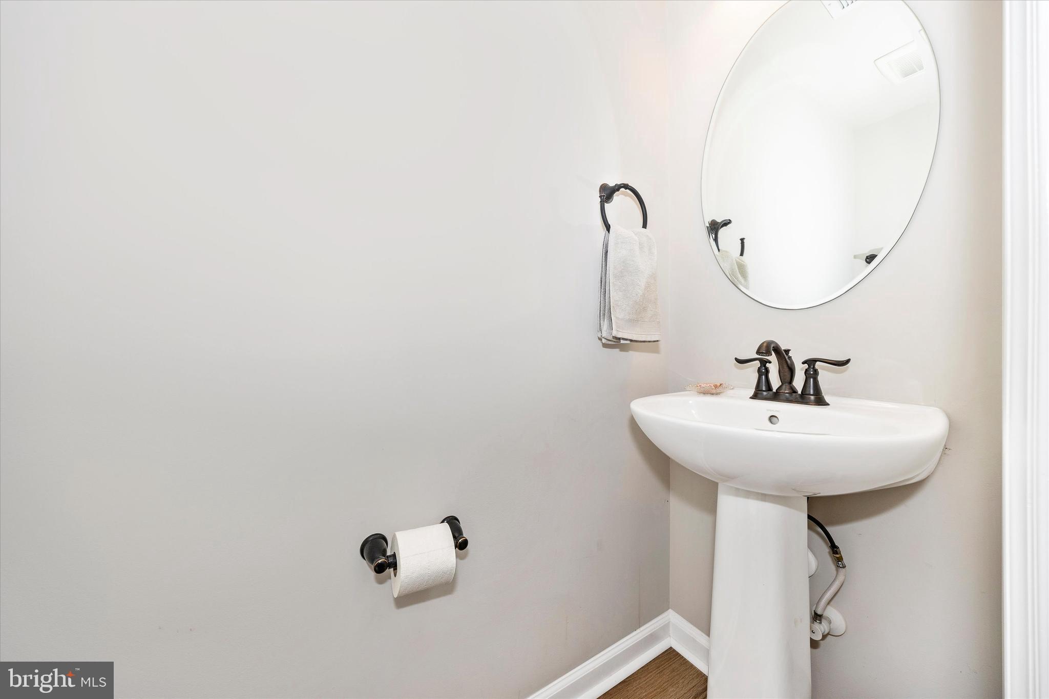 6032 Forum Square Frederick, MD 21703 - Photo 12 of 40 Half bath on main level