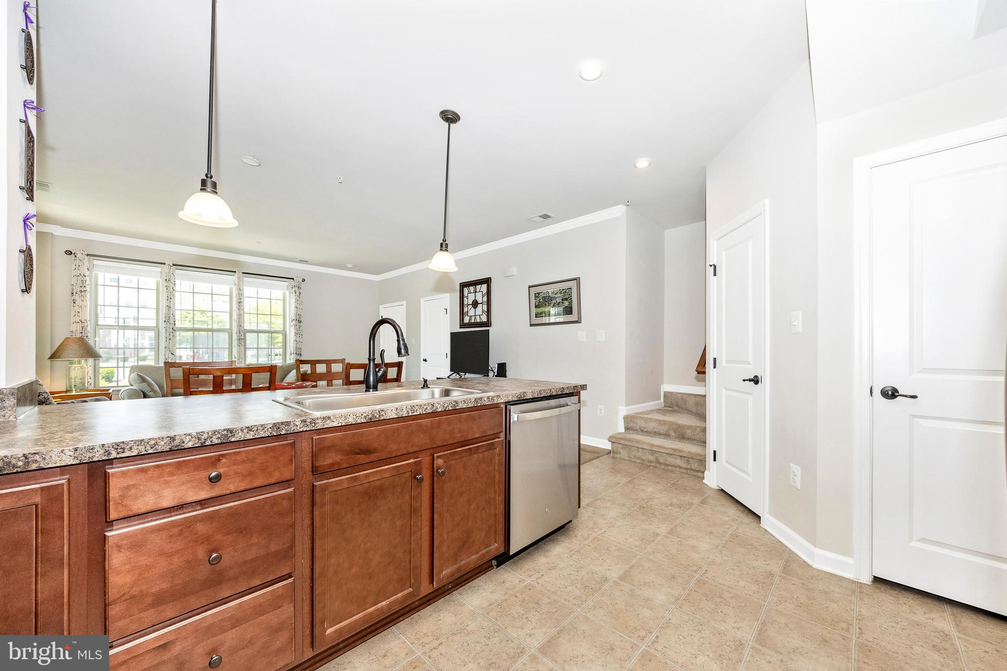 6032 Forum Square Frederick, MD 21703 - Photo 14 of 40 View from kitchen heading upstairs