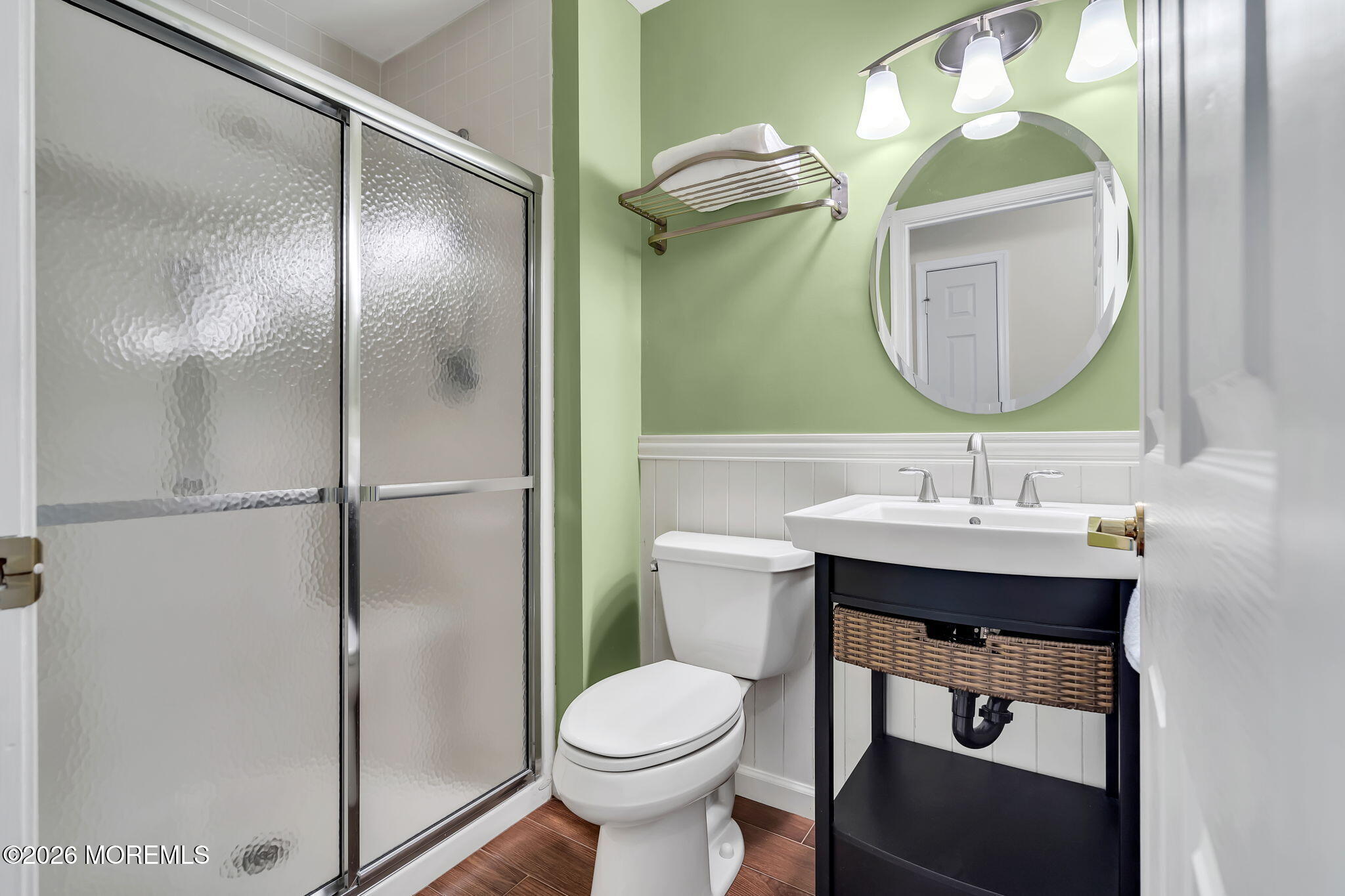 10 Congressional Road Jackson, NJ 08527 - Photo 47 of 72 a bathroom with a toilet a sink and mirror