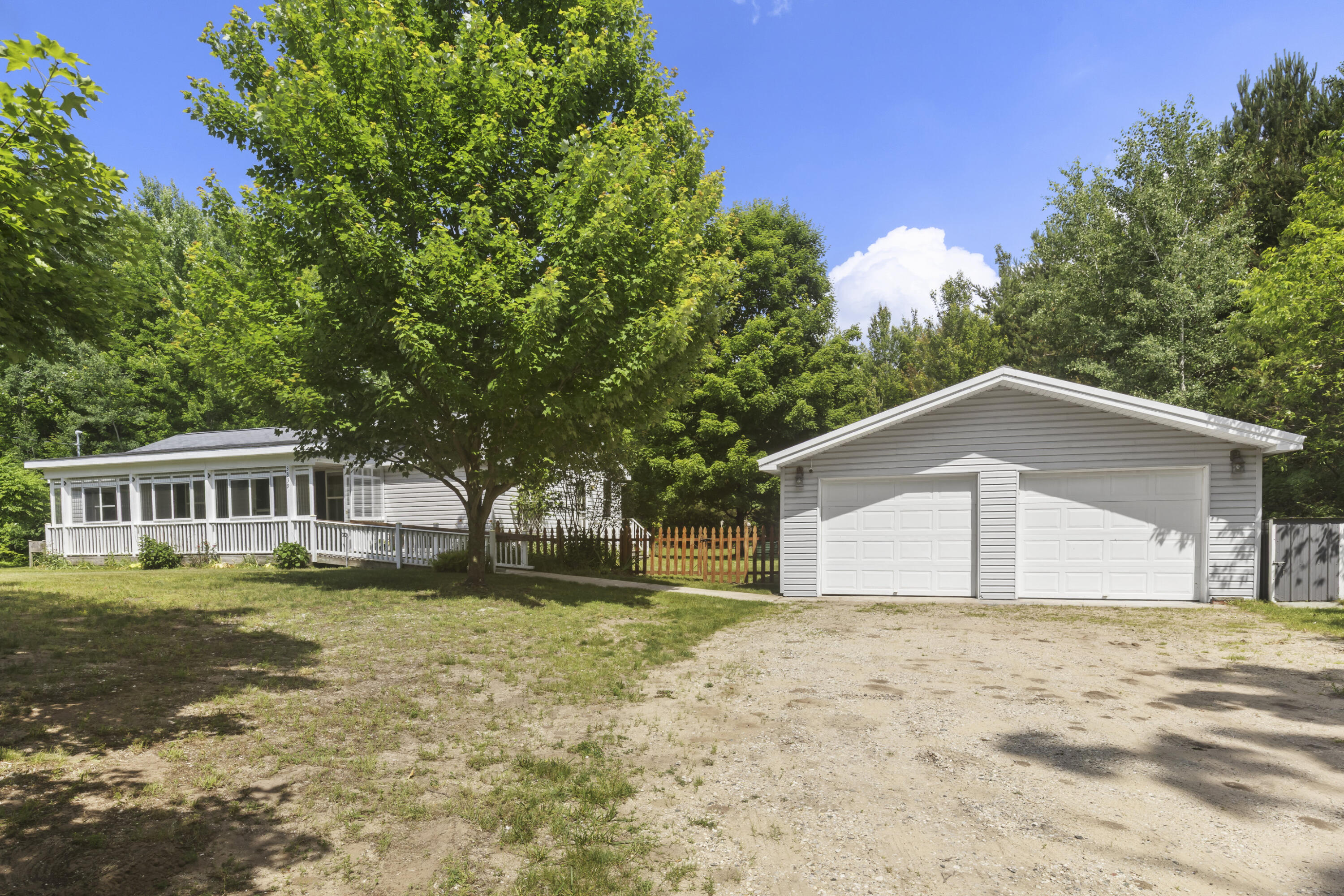 3839 Wallaker Road Benzonia, MI 49616 - Photo 3 of 37 0S5A1437