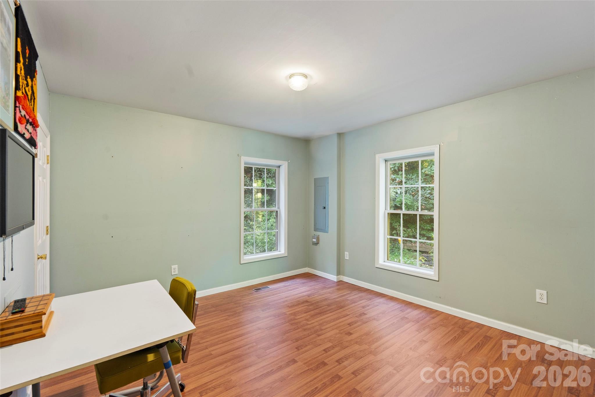 319 Glenn Bridge Road, Unit 24 Arden, NC 28704 - Photo 14 of 37 a workspace with furniture hardwood and a window
