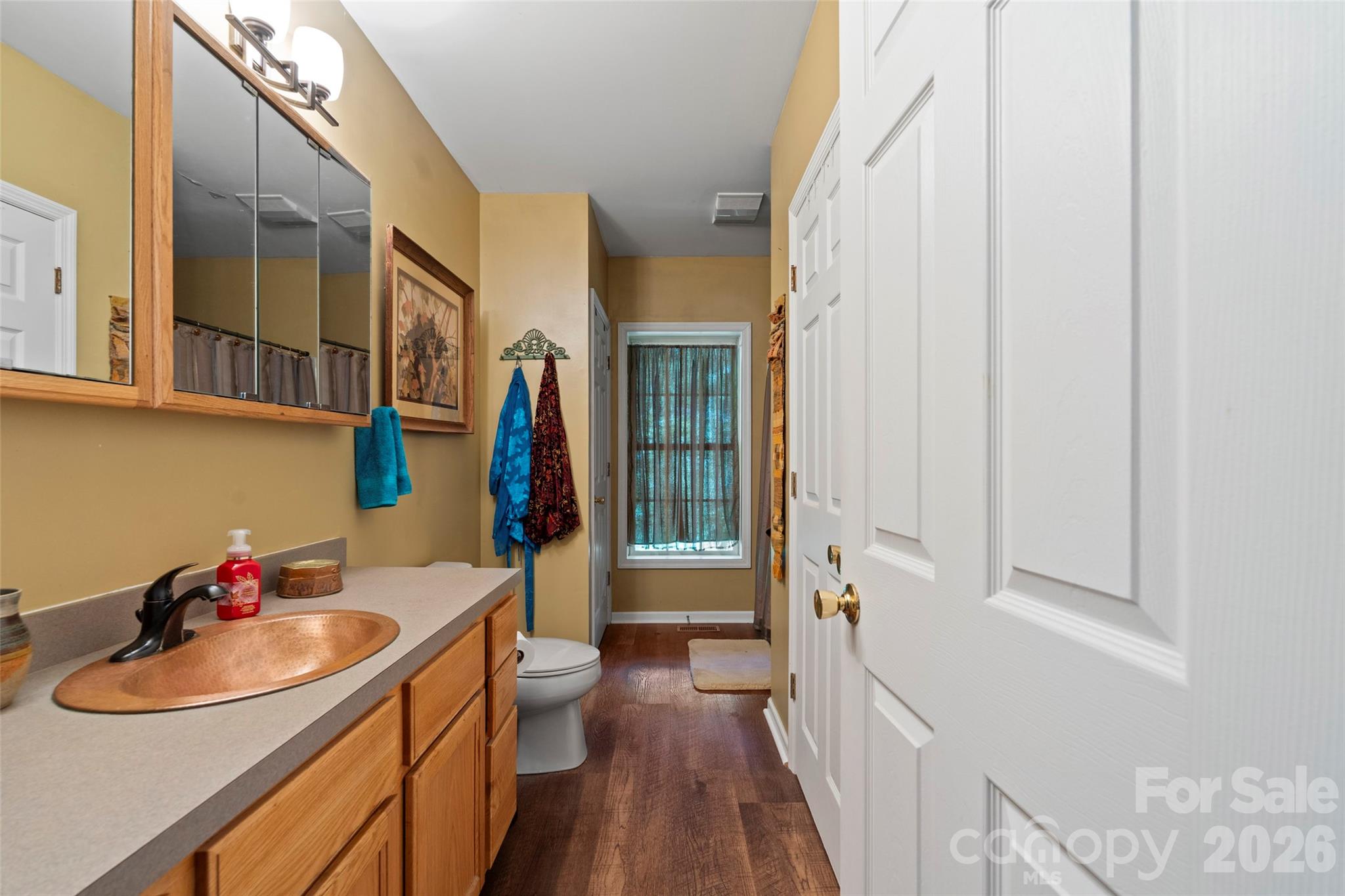319 Glenn Bridge Road, Unit 24 Arden, NC 28704 - Photo 19 of 37 a bathroom with a sink and a mirror