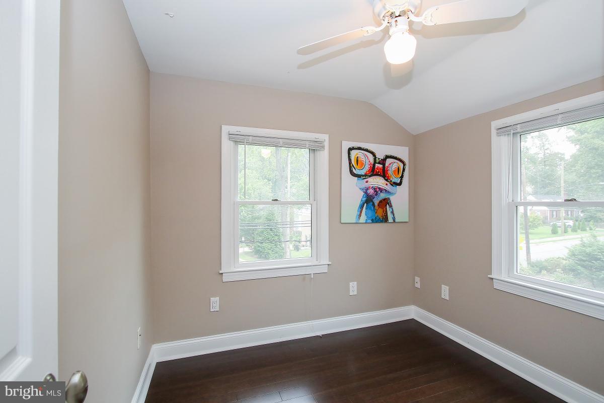 5612 Greentree Road Bethesda, MD 20817 - Photo 16 of 28 wooden floor in an empty room with a window