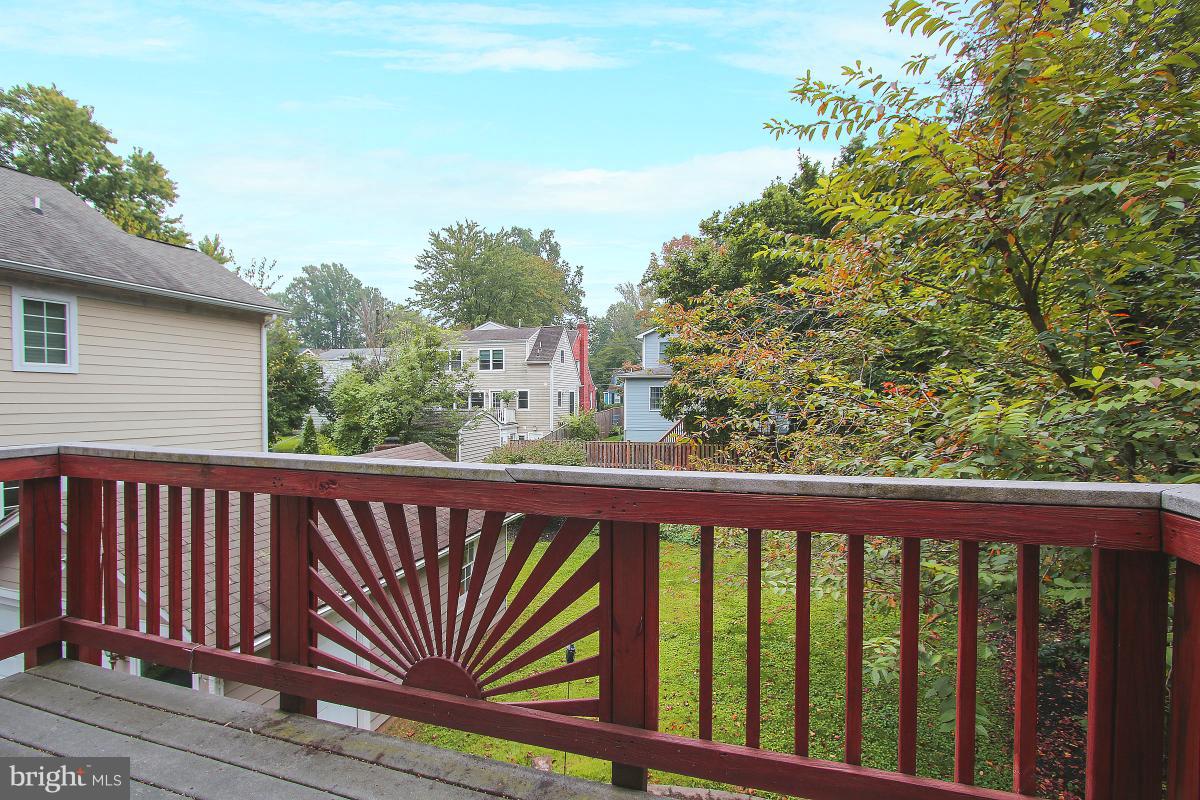 5612 Greentree Road Bethesda, MD 20817 - Photo 20 of 28 a view of a balcony with wooden fence and floor