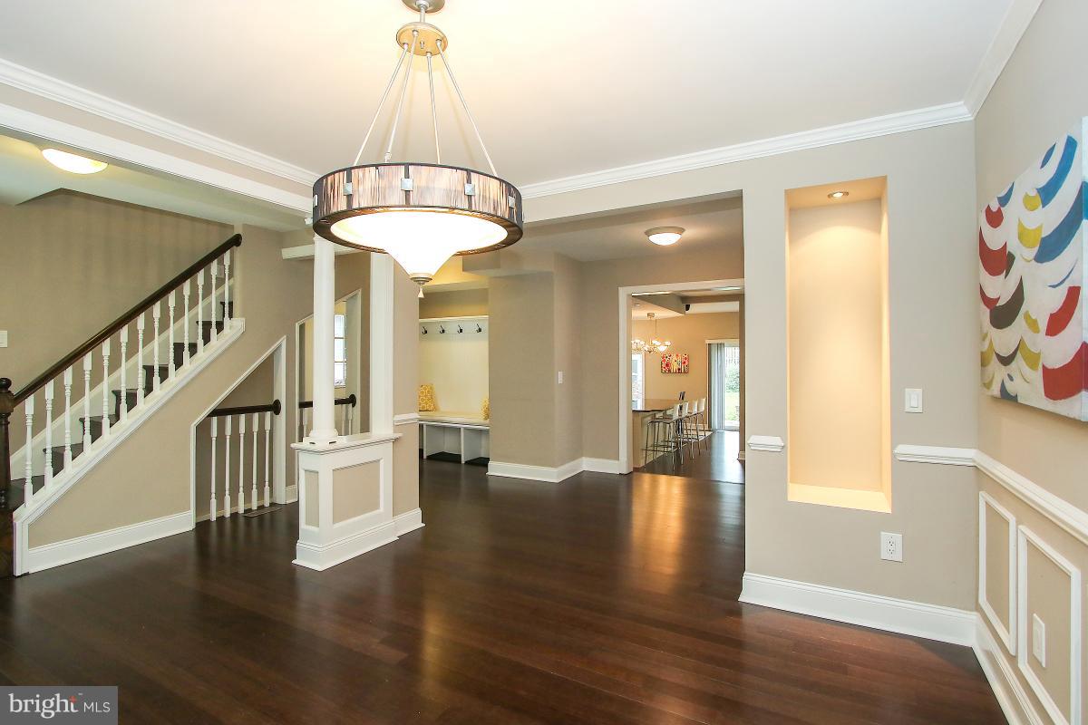 5612 Greentree Road Bethesda, MD 20817 - Photo 6 of 28 a view of an entryway with wooden floor