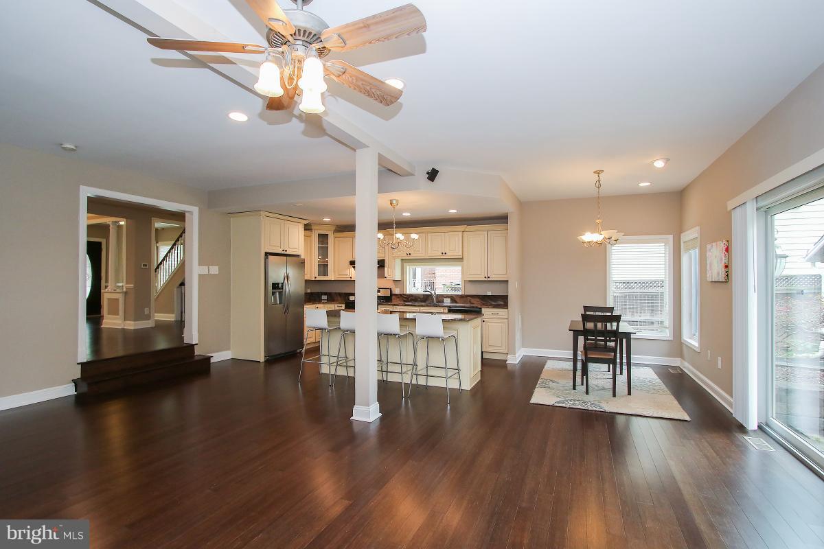 5612 Greentree Road Bethesda, MD 20817 - Photo 10 of 28 a living room with furniture and a large window
