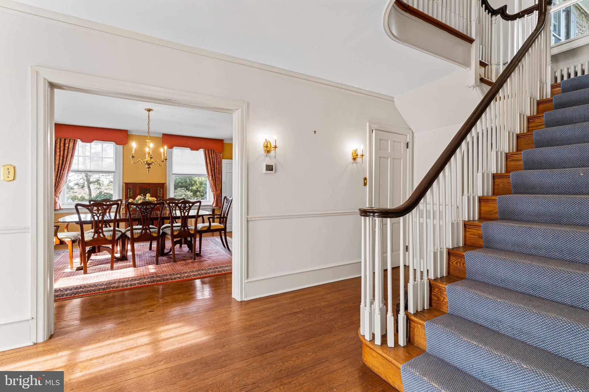 764 Glen Road Jenkintown, PA 19046 - Photo 12 of 57 a view of a livingroom with wooden floor and a floor to ceiling window
