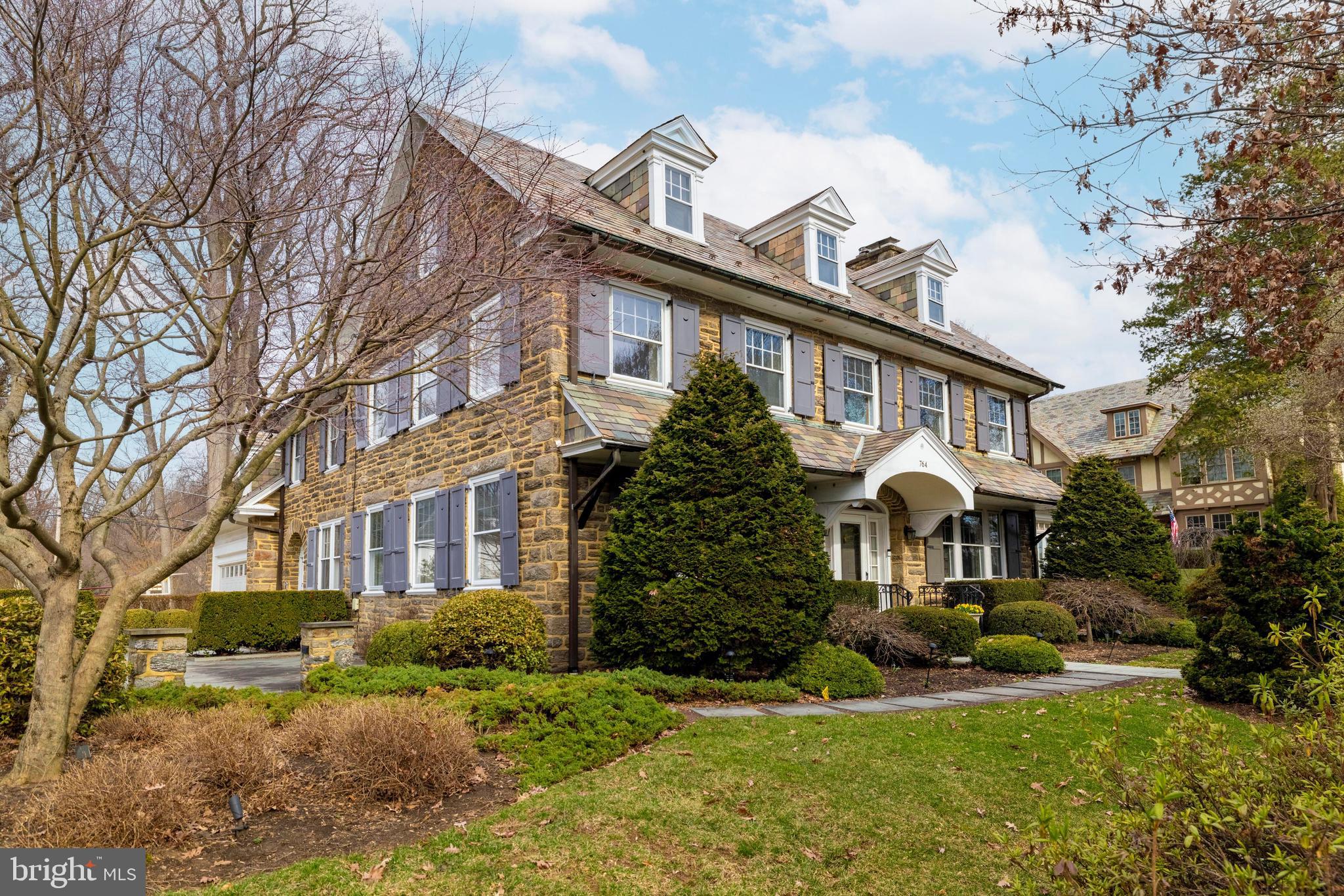 764 Glen Road Jenkintown, PA 19046 - Photo 3 of 57 a front view of a house with a yard and porch