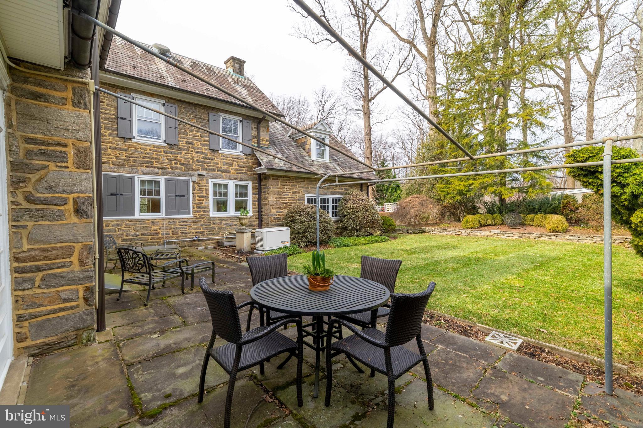 764 Glen Road Jenkintown, PA 19046 - Photo 40 of 57 a view of a patio with a table chairs and a table