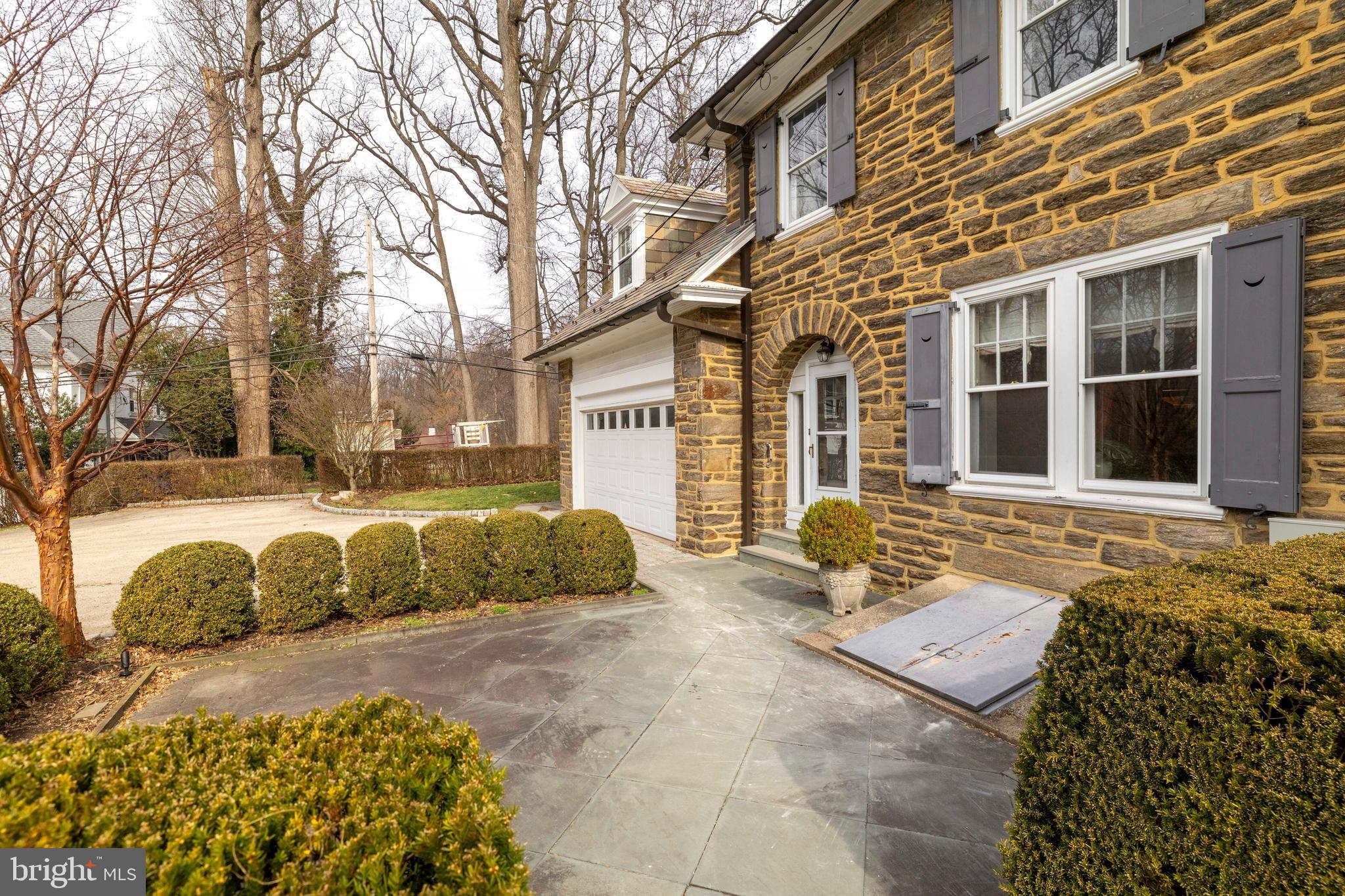 764 Glen Road Jenkintown, PA 19046 - Photo 41 of 57 a front view of a house with a yard