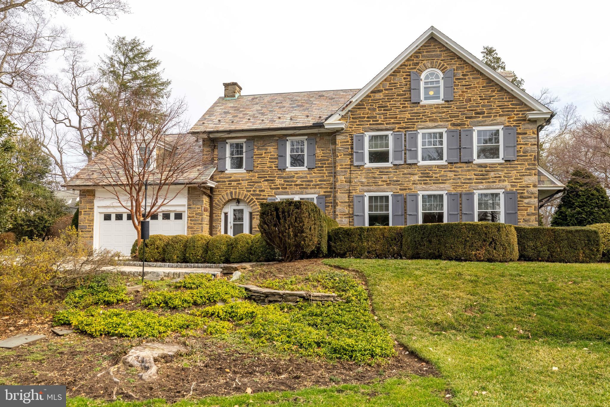 764 Glen Road Jenkintown, PA 19046 - Photo 42 of 57 a front view of a house with a yard