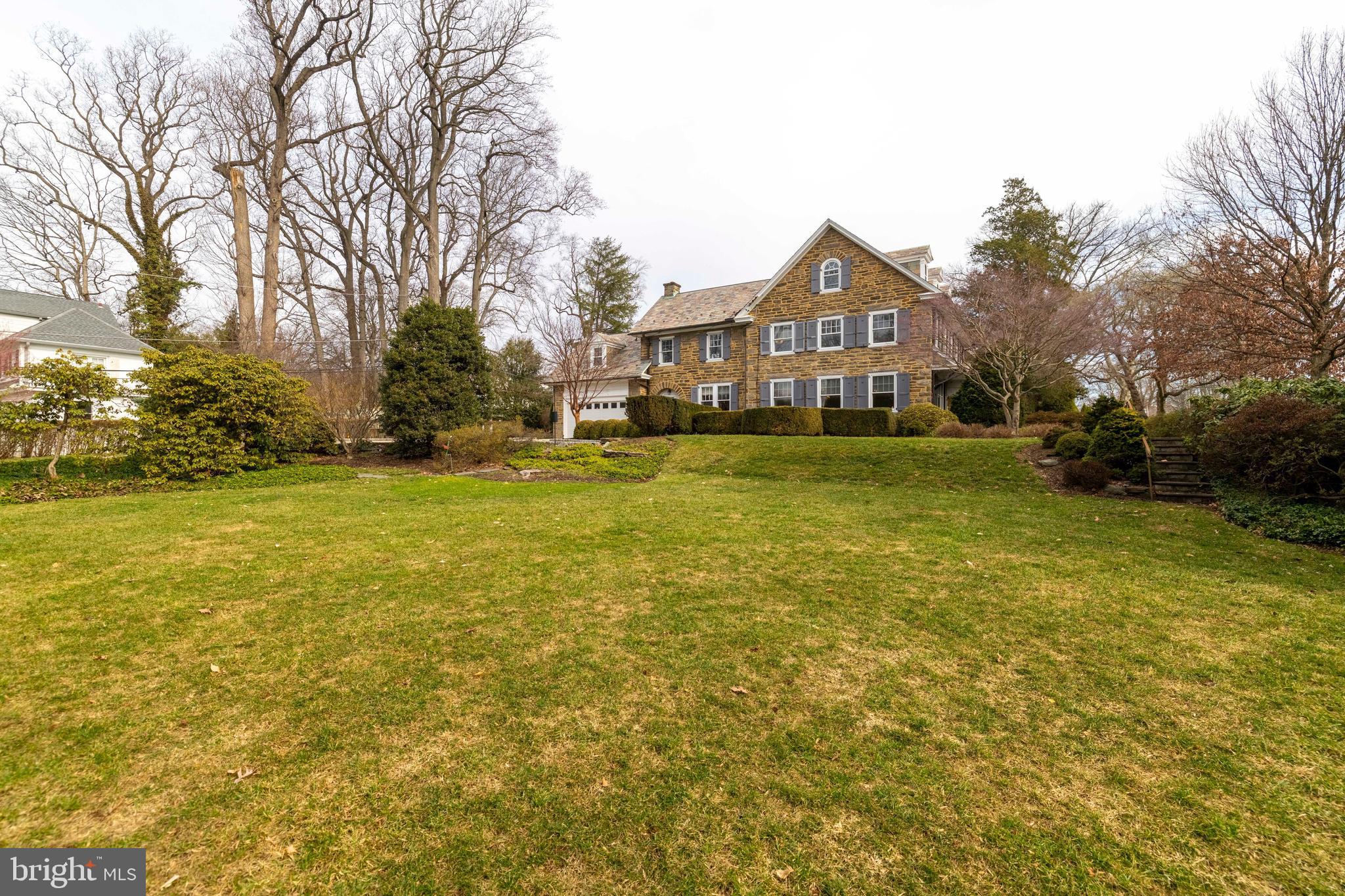 764 Glen Road Jenkintown, PA 19046 - Photo 47 of 57 a front view of a house with a yard