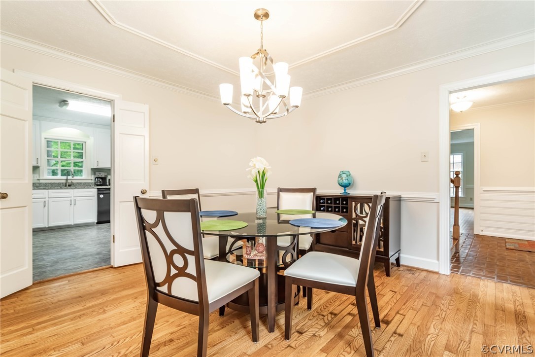 6 Staples Road Williamsburg, VA 23185 - Photo 17 of 37 a view of a dining room with furniture and wooden floor