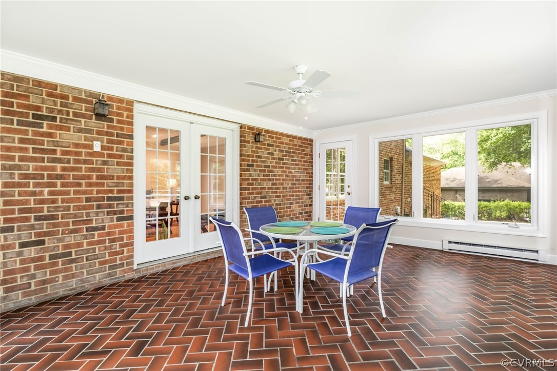 6 Staples Road Williamsburg, VA 23185 - Photo 32 of 37 a view of a dining room with furniture window and wooden floor