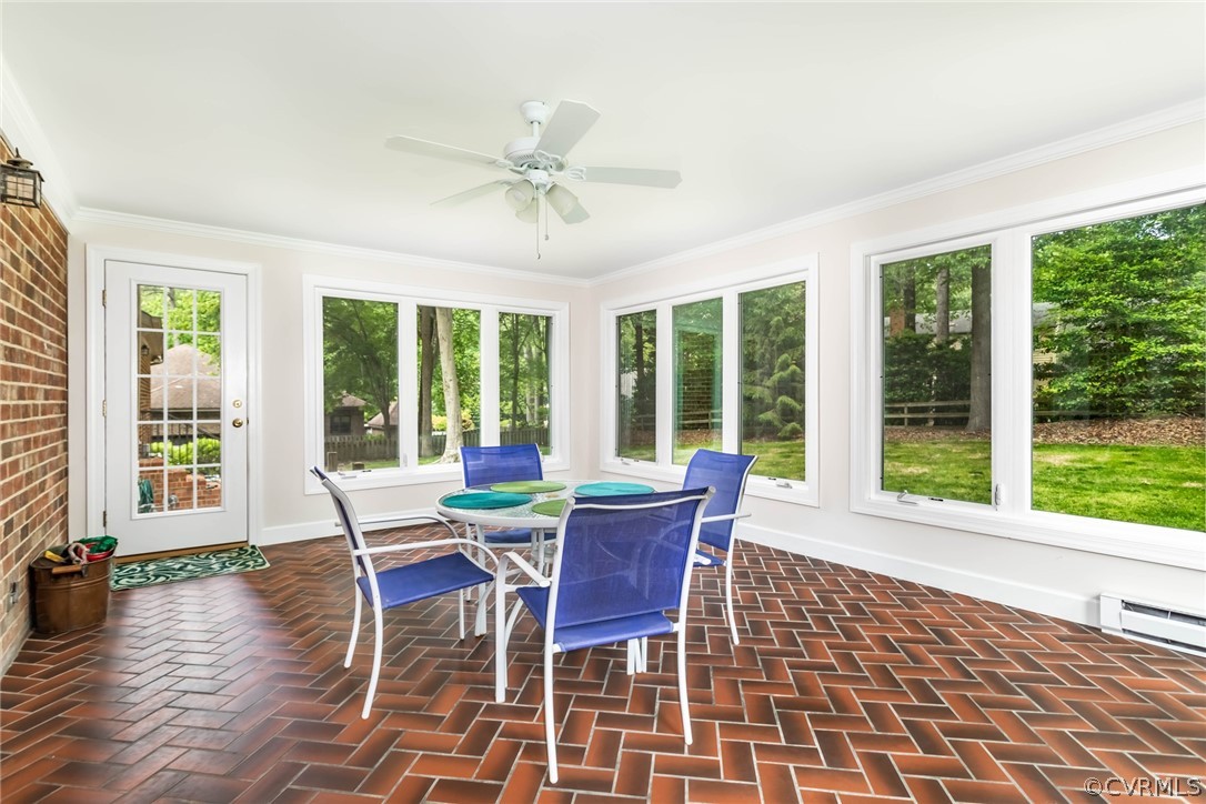 6 Staples Road Williamsburg, VA 23185 - Photo 34 of 37 a dining room with furniture large windows and wooden floor