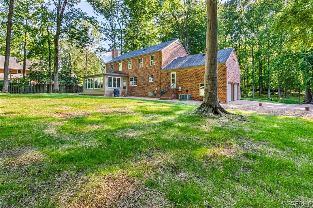 6 Staples Road Williamsburg, VA 23185 - Photo 36 of 37 a house that has a big yard and large trees