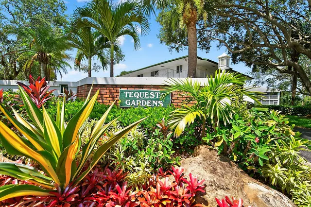 a kitchen with a sink stove and microwave