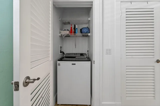 a view of a door and a window