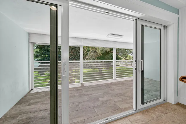 a view of a garden from a porch