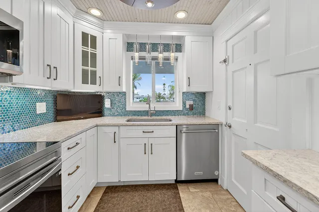 a picture of a bathroom with a glass door