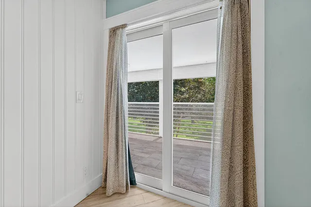 a view of a room with racks on the wall