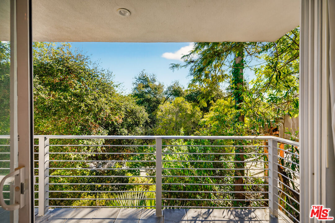 2388 Kimridge Road Beverly Hills, CA 90210 - Photo 16 of 54 a view of outdoor space with swimming pool