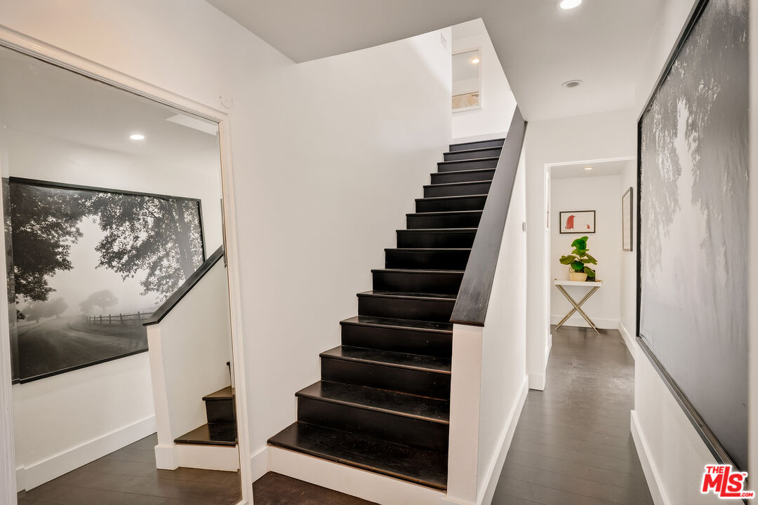 2388 Kimridge Road Beverly Hills, CA 90210 - Photo 20 of 54 a view of entryway with wooden floor and stairs