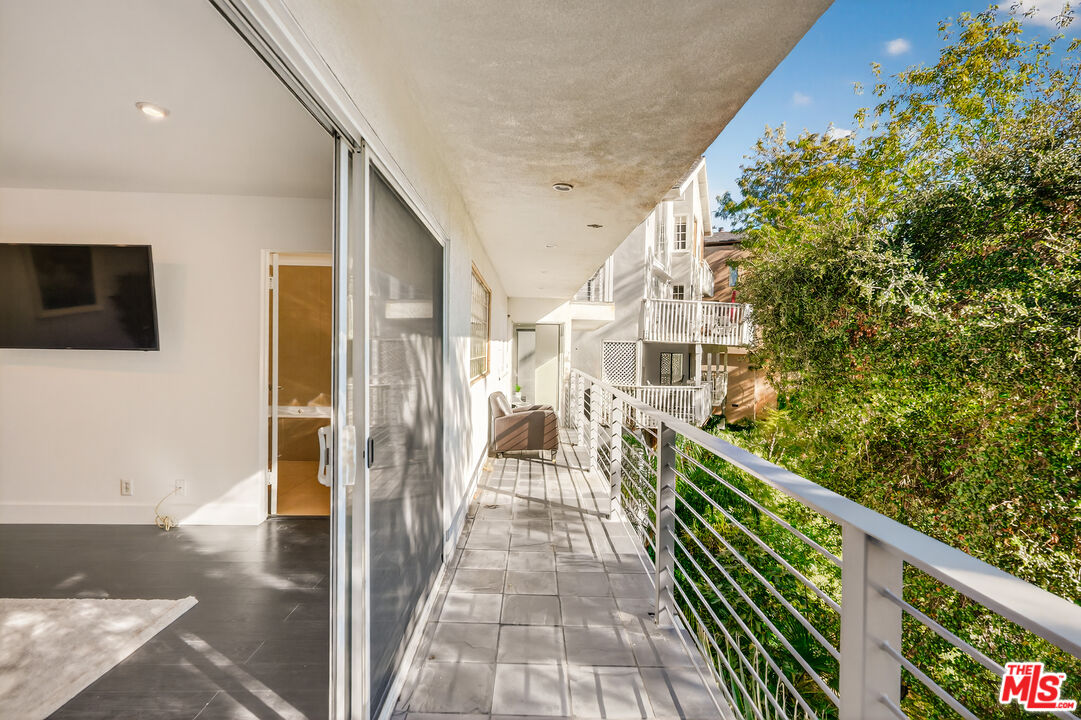 2388 Kimridge Road Beverly Hills, CA 90210 - Photo 23 of 54 a view of a balcony