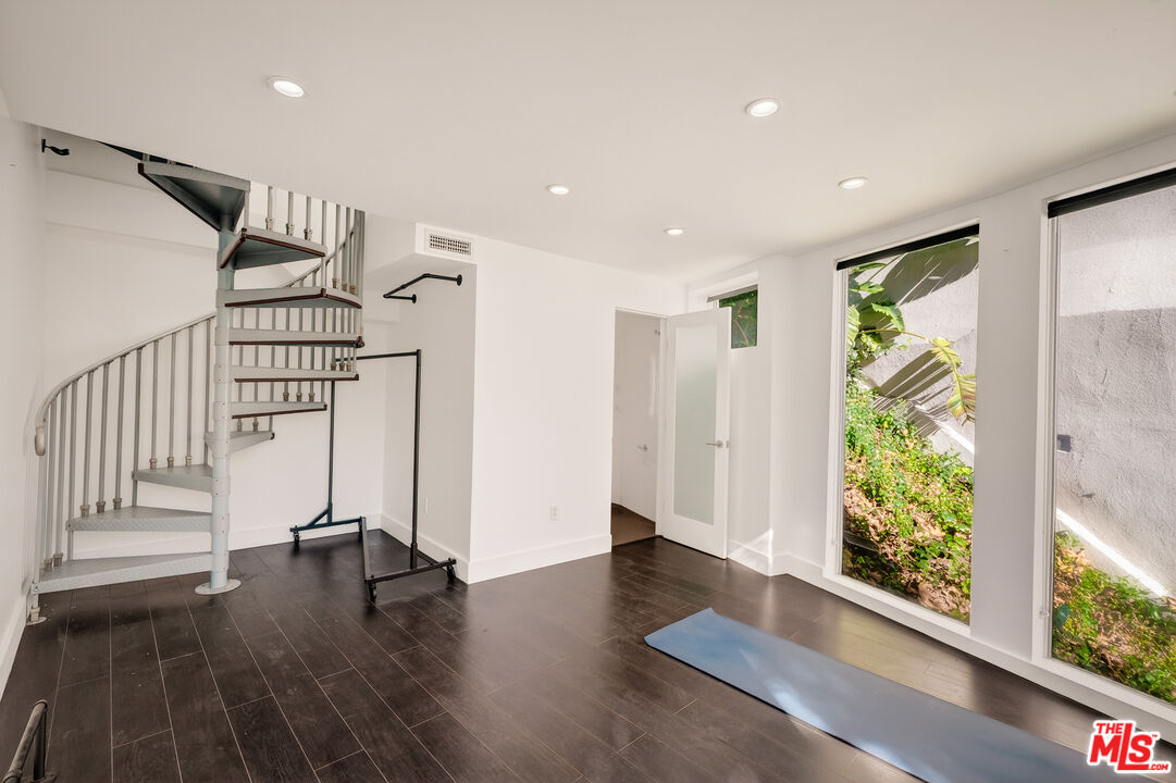 2388 Kimridge Road Beverly Hills, CA 90210 - Photo 36 of 54 a view of entryway with wooden floor