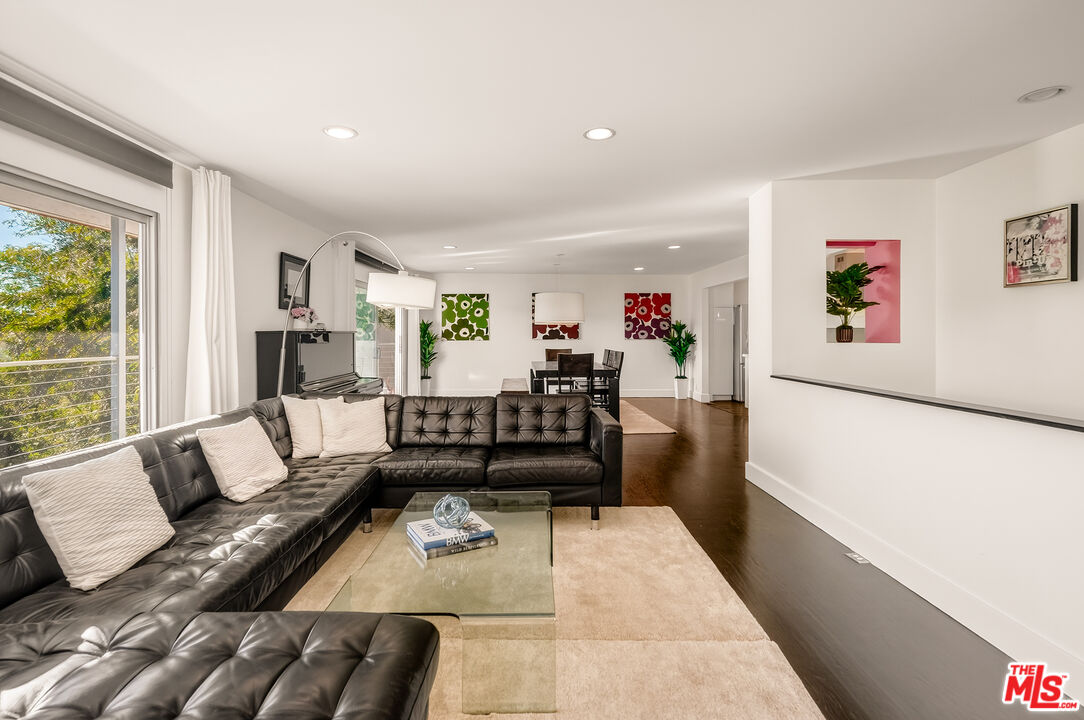 2388 Kimridge Road Beverly Hills, CA 90210 - Photo 4 of 54 a living room with furniture and a large window
