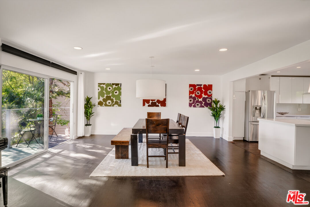 2388 Kimridge Road Beverly Hills, CA 90210 - Photo 8 of 54 a living room with furniture and a wooden floor