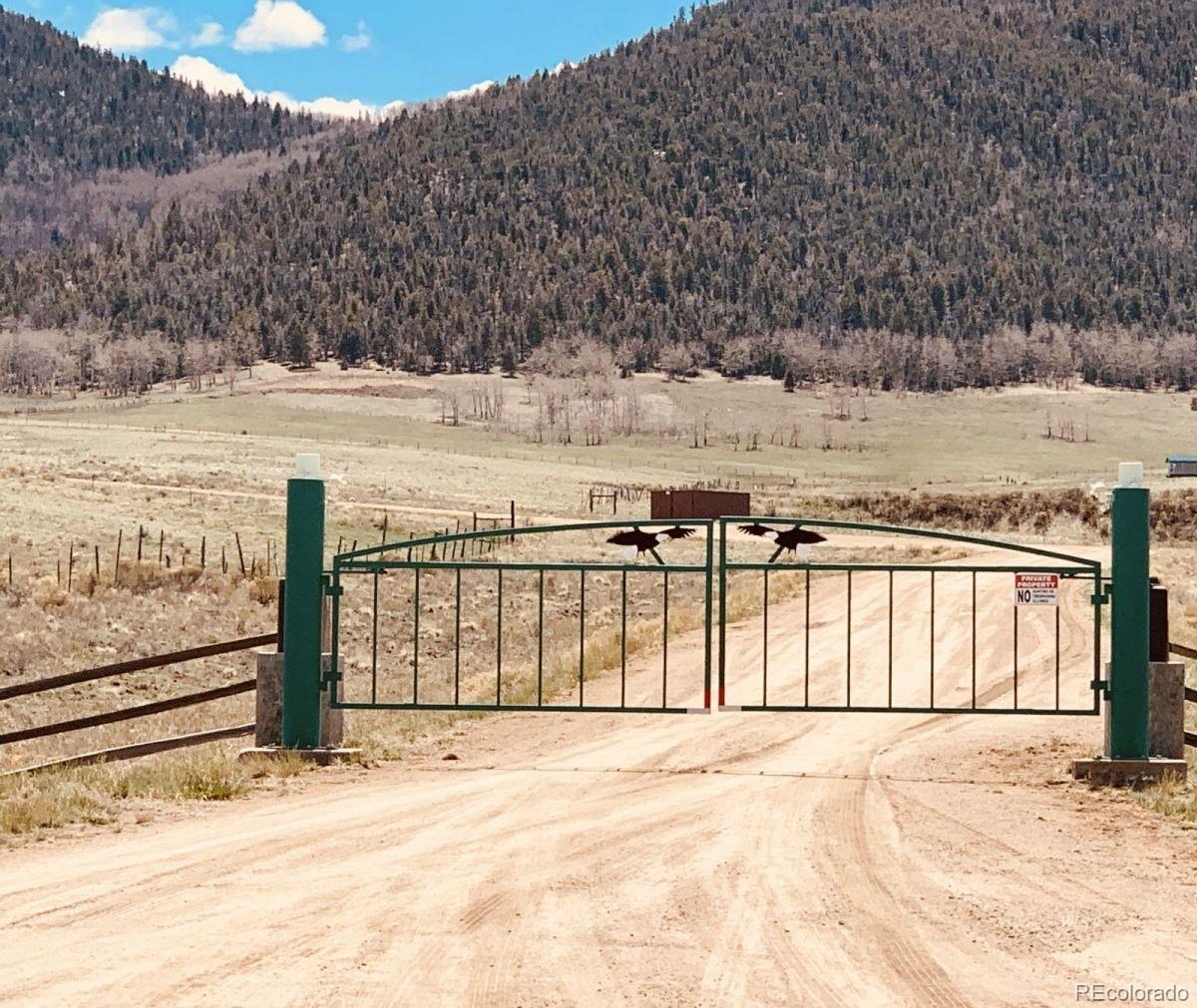 Eagle Springs Road Westcliffe, CO 81252 - Photo 9 of 10 a view of a parking space with wooden fence
