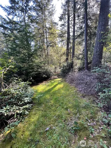 a view of a brick building with glass windows