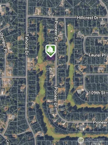 a picture of a table with a vase of flowers