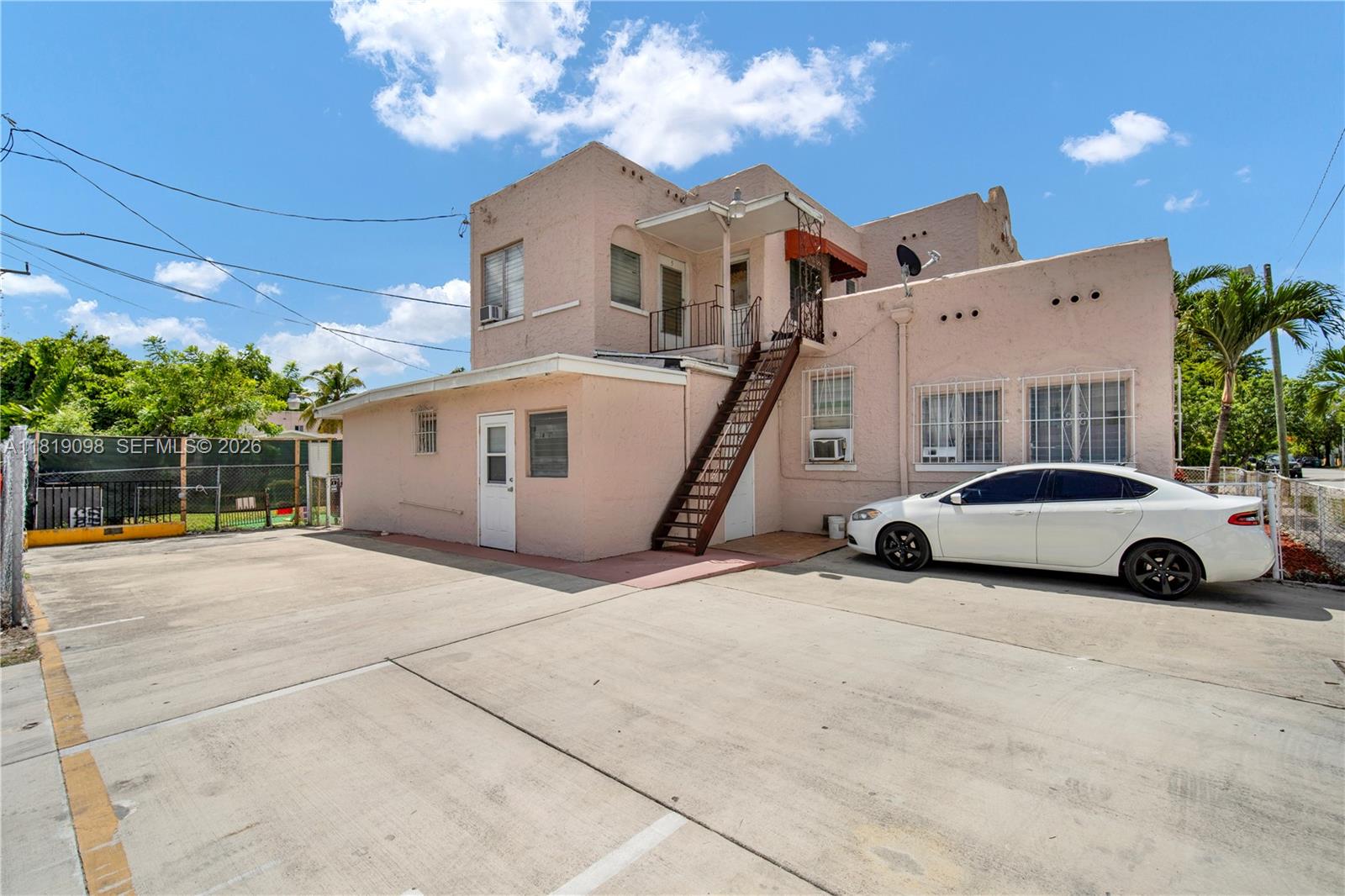 829 Southwest 19th Avenue Miami, FL 33135 - Photo 48 of 54 a view of a cars park in front of house