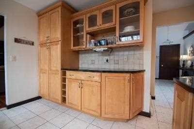 44 Flower Road East Fishkill, NY 12533 - Photo 11 of 30 a view of a refrigerator and cabinets