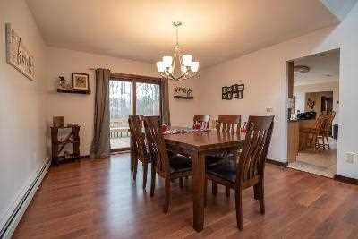 44 Flower Road East Fishkill, NY 12533 - Photo 15 of 30 a view of a dining room with furniture window and wooden floor