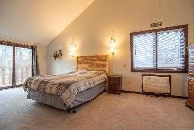 44 Flower Road East Fishkill, NY 12533 - Photo 18 of 30 a spacious bedroom with a bed and two windows