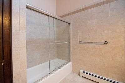 44 Flower Road East Fishkill, NY 12533 - Photo 23 of 30 a bathroom with a shower and a bath tub