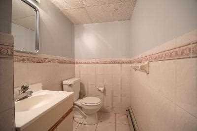 44 Flower Road East Fishkill, NY 12533 - Photo 24 of 30 a bathroom with a sink a toilet and shower