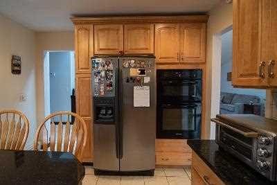 44 Flower Road East Fishkill, NY 12533 - Photo 9 of 30 a kitchen with stainless steel appliances granite countertop a refrigerator a stove and a sink